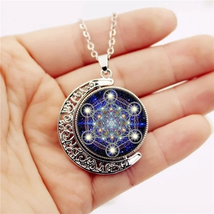 Rotating moon pendant necklace with mandala geometric glass dome in silver tone finish