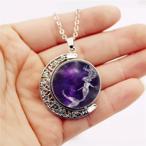 Rotating mermaid crescent moon pendant necklace with purple celestial glass gemstone