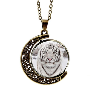 Vintage bronze spinning moon necklace with white tiger glass gem and crescent pendant