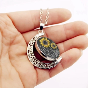 Collier lune You are my sunshine avec pendentif tournant tournesol double face