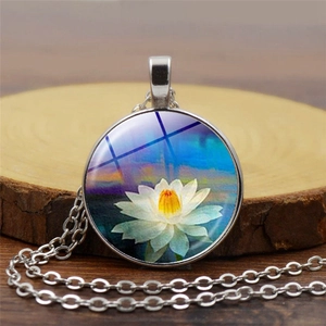 Bohemian glass pendant necklace with white lotus pattern on a silver alloy chain