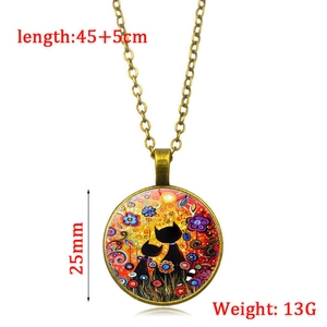Close-up of cat art pendant with 25mm diameter and 45cm bronze chain measurements