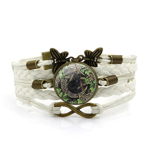 Multilayer Wicca black cat bracelet with infinity charm and butterfly bronze accents