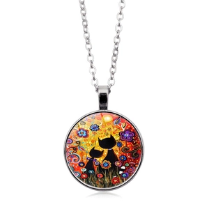 Cute black cats and flowers illustration on a round glass gem pendant necklace
