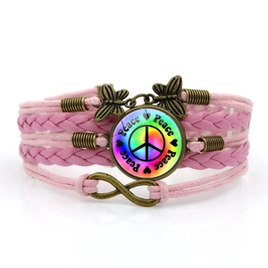 Pink multi-layer braided peace sign bracelet with butterfly and infinity charms
