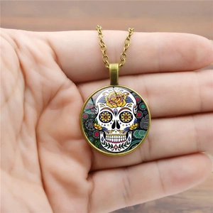 Mexican sugar skull necklace with colorful glass pendant and vintage bronze alloy chain