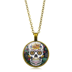 Detail of Mexican sugar skull pendant necklace with retro bronze finish and floral patterns