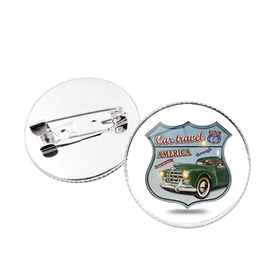 Detailed view showing the front and back of a vintage Route 66 glass gem brooch with safety pin