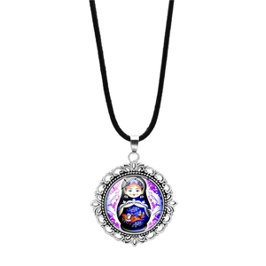 Detail of Russian doll glass pendant with vintage silver hollow flower frame design