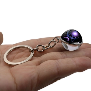 Libra zodiac keychain with double-sided crystal ball and purple starry sky pattern