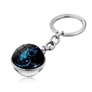 Detailed view of Aquarius zodiac silver keychain with a blue stellar crystal ball pendant