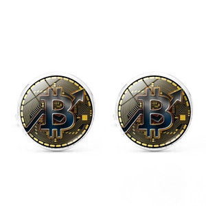 Close-up of Bitcoin cufflinks with golden circuit pattern under clear glass dome