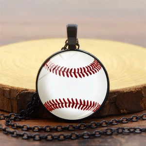 Baseball pattern glass pendant necklace with black chain on a rustic wooden base