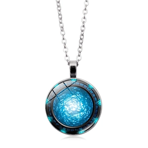 Macro shot of Stargate Atlantis glass pendant with blue nebula pattern on silver chain