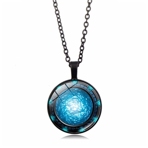 Detailed macro view of the Stargate pendant showing the intricate blue vortex glass dome