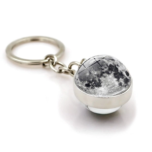 Solar system Moon glass ball keychain with silver polished metal ring on white background