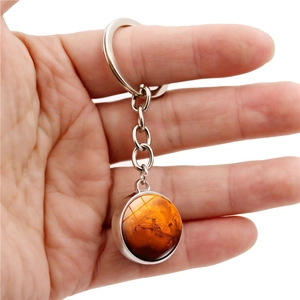 Handheld Mars planet galaxy keychain with orange celestial glass orb and silver alloy ring