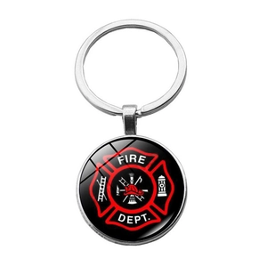 Detailed view of firefighter emblem keychain with silver ring and fire dept logo