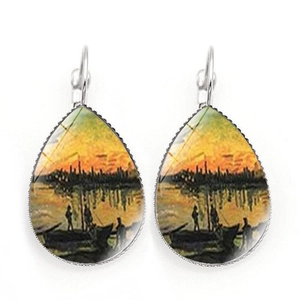 Detailed view of silver teardrop earrings featuring Van Gogh's Starry Night art style