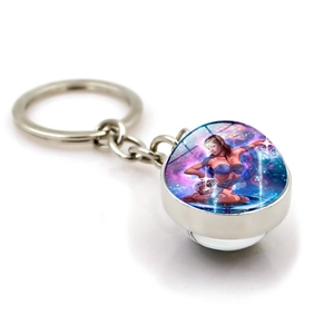 Silver Aquarius constellation keychain with double-sided glass ball and fantasy illustration
