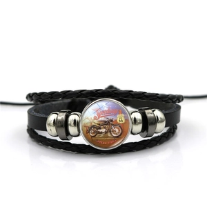 Close-up of retro Route 66 multi-layer leather bracelet with glass cabochon and beads