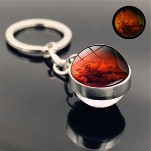 Glow in the dark Mars planet keychain with silver alloy base and glass cabochon