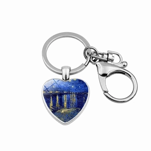 Detail of heart-shaped keychain with Starry Night art and silver lobster clasp