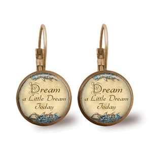 Detail of vintage lever-back earrings with Dream a Little Dream Today text and blue flowers
