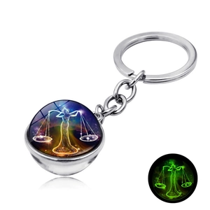 Portachiavi Bilancia zodiacale luminoso con sfera di vetro ed effetto fosforescente