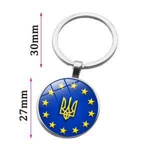 Detail view of a 27mm Ukraine emblem keychain with precise dimension markings in mm