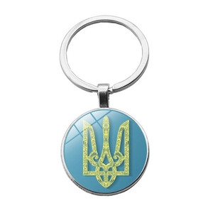 Silver Ukraine flag keychain with coat of arms pendant on clean white background