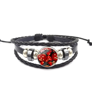 Halloween multilayer leather bracelet with black braided cord and pumpkin glass gem charm