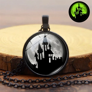 Luminous Halloween necklace featuring a dark castle under full moon with green glow effect