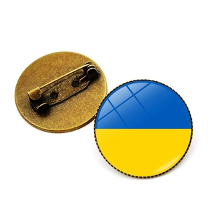 Vintage-Bronze-Anstecknadel mit Ukraine-Flagge und Glaskuppel, Vorder- und Rückansicht