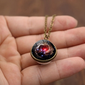 Vintage galaxy nebula pendant necklace with bronze chain and double-sided glass ball
