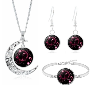 Detailed view of Scorpio constellation silver jewelry set with moon pendant and nebula patterns