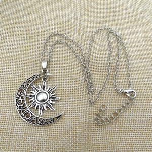 Retro antique silver sun and crescent moon pendant necklace with hollow star patterns
