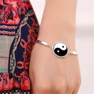 Silver-tone chain bracelet with black and white Yin Yang pendant charm for women