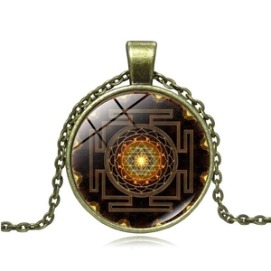 Sacred Sri Yantra bronze pendant necklace with geometric mandala art glass dome