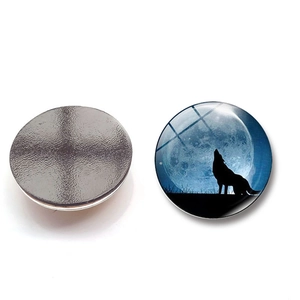 Detailed view showing the front glass moon wolf pattern and the back magnetic surface