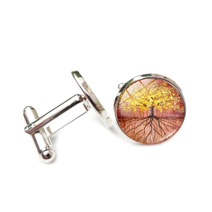 Detailed view of silver tree of life cufflinks with glass cabochon and swivel back