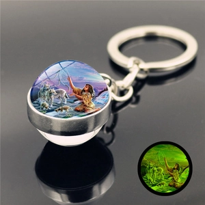 Luminous dreamcatcher wolf keychain with glass cabochon ball and glow in the dark effect
