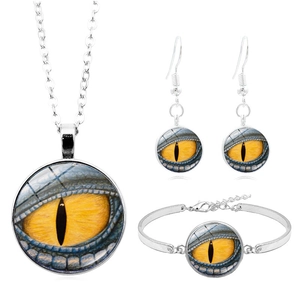 Silver jewelry set featuring vibrant orange dragon eye glass cabochons and matching earrings