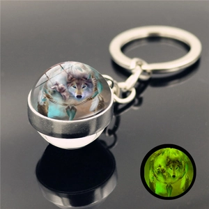 Luminous wolf totem glass ball keychain with metal ring and glowing green fluorescence