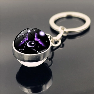 Gemini zodiac crystal glass ball keychain with silver metal ring and purple galaxy motif