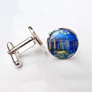 Detail of Starry Night glass dome cufflinks with silver polished metal T-back closure