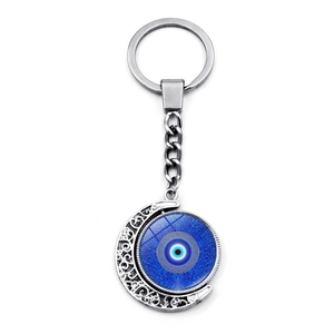 Porte-clés œil grec bleu avec pendentif lune rotatif double face en métal argenté