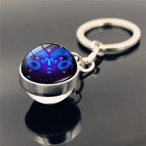 Aries zodiac keychain featuring double-sided glass ball and silver metal key ring