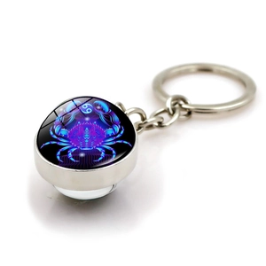 Cancer zodiac keychain with blue luminous double-sided glass ball and silver metal ring