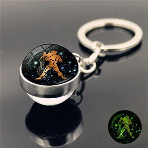 Porte-clés zodiaque Verseau phosphorescent avec effet lumineux vert éclatant
